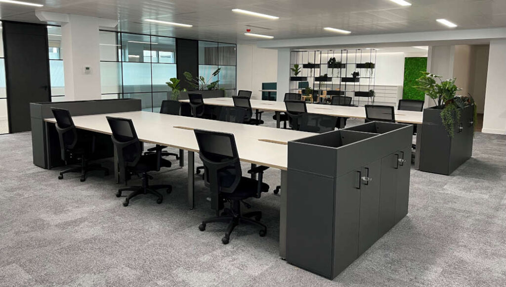 High-quality refurbished office furniture installed in a modern startup workspace.